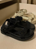 ROMY – Sandales plates noires